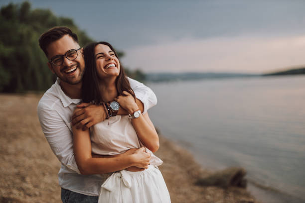 A Couple Having fun on the beach. Love and Relationship Spells