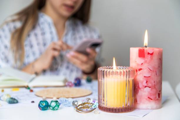 Love spell caster in Texas performing candle magic with crystal tools. San Antonio Love Spell