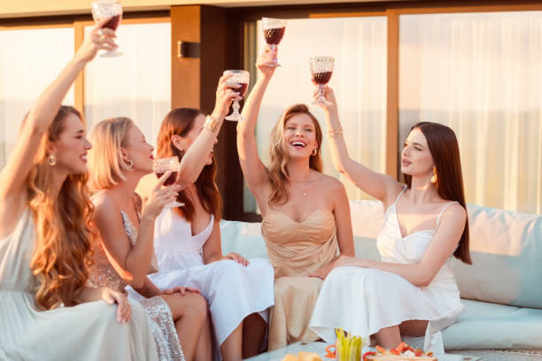 A group of women sitting and rejoicing. Glamour Magic