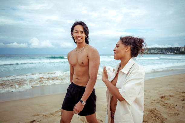 A Couple walking on beach. Best Love Spells in Melbourne