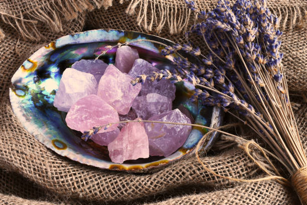 Rose quartz, amethyst, and moonstone crystals used in powerful love spells that work fast.