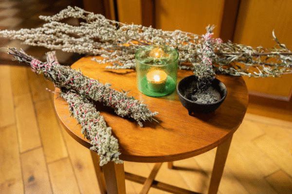 Sangoma in Johannesburg performing spiritual cleansing with herbs and candles