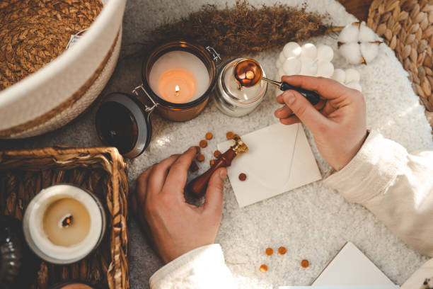 A Woman Casting A Spell at Home Using Essential Oil and Candles. How to Cast a Love Spell at Home