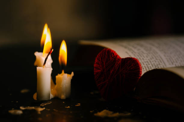 Burning Candles with a heart. Cast a Love Spell at Home