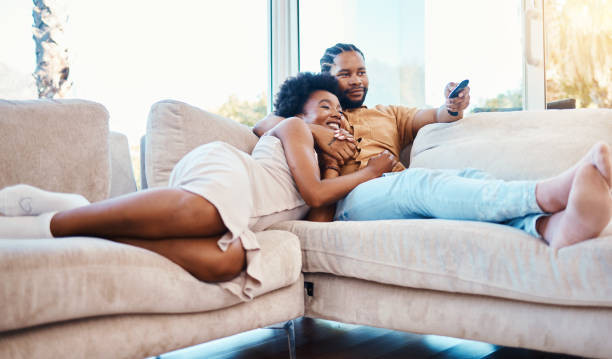 A Couple Watch A Movie Together. Love Spell Symptoms