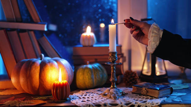 A Hand of A Woman Lighting a Candle Spell. How to Cast a Love Spell at Home