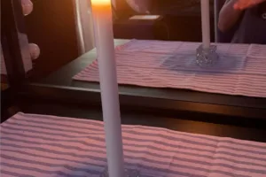 Obsession spell traditional altar ritual with white candle and circle of salt