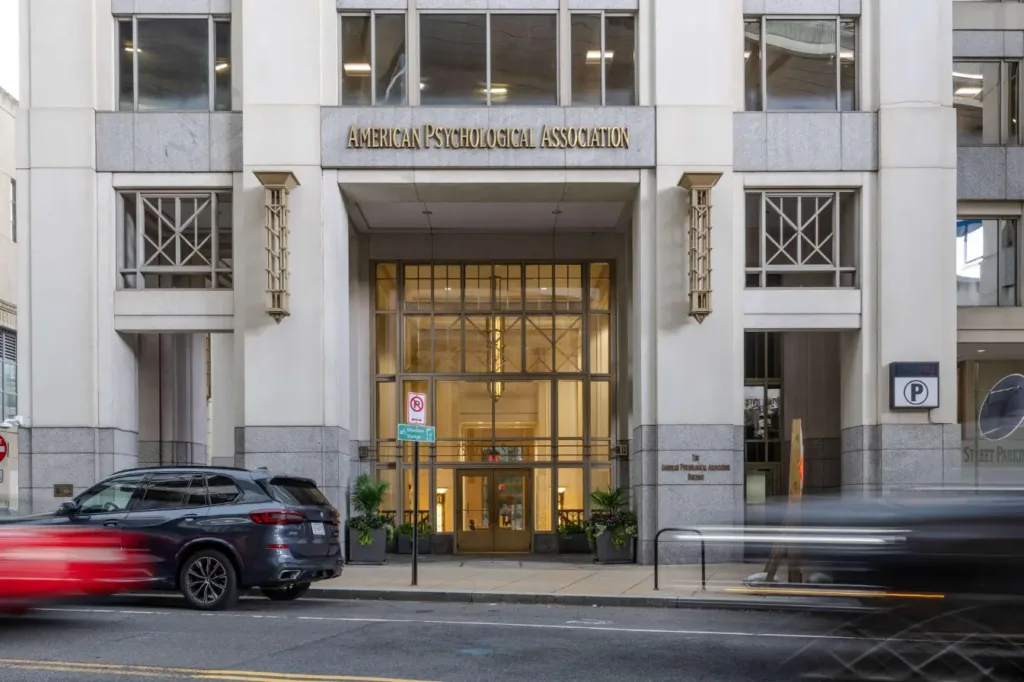 A clear image showing American Psychological Association building where to explore how expectations and placebo responses can influence human perception and behaviour
