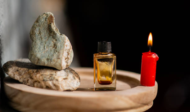 Hoodoo Reconciliation Spells for a Lover 2 Rose oil for anointing candles in Hoodoo love spells
