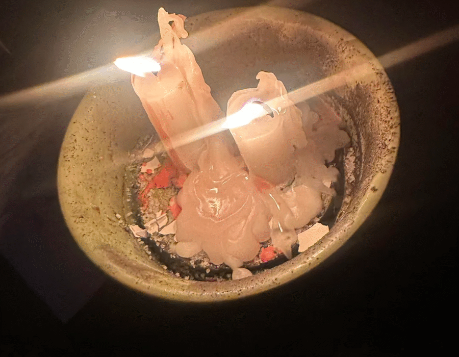Traditional Mauritian altar setup for the best love spells in Mauritius at sunset