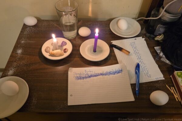 Real love spell caster Batha's altar with candles, crystals, eggs, salt circle and petition