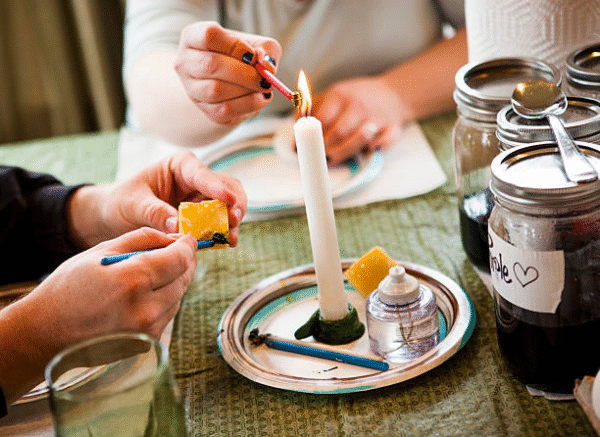Get My Ex Back Spells Texas 4 Client lighting intention candle during Batha's guided ritual