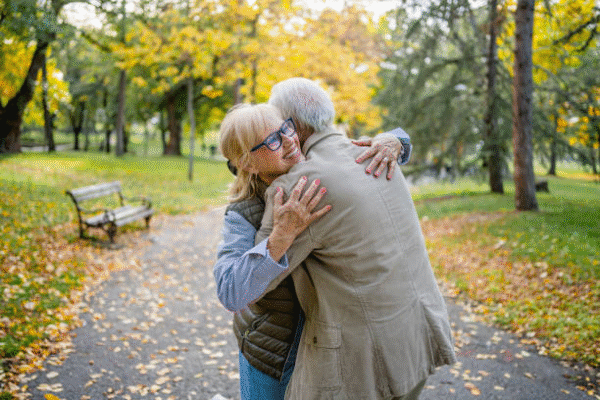 Reunited couple embracing after successful spells to get someone back in your life