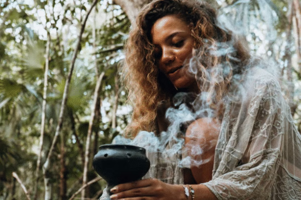 Local Soweto sangoma preparing herbal remedies for bad luck removal