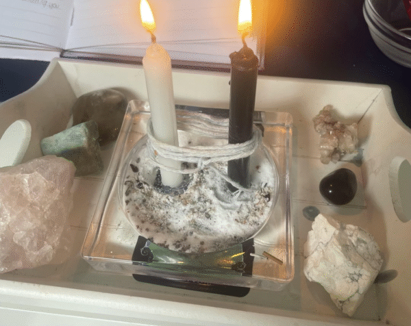 Prof. Batha performing powerful love spells in Atlanta with candles and herbs