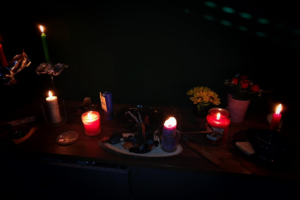 Spell to Keep Husband ritual with candles and rose petals